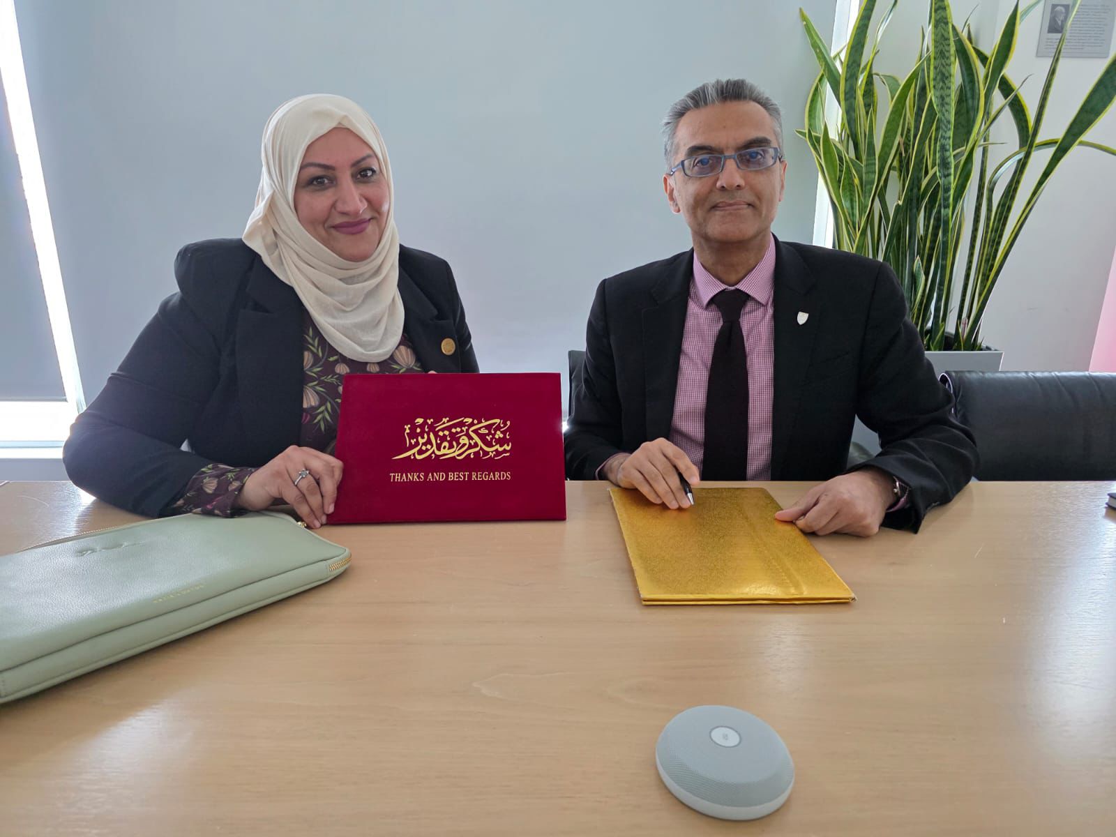 Dr. Asma at a partnership meeting